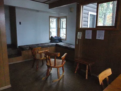 Rusty's Cabin living area with wood stove