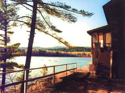 Ginger's Cabin exterior with sunroom overlooking Georgian Bay, Killarney Ontario